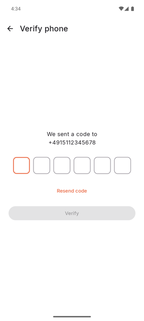 The phone verification screen, waiting for a six-digit code sent by SMS